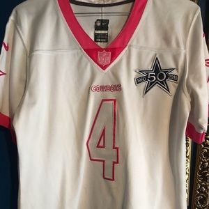 Woman on the field Prescott jersey
